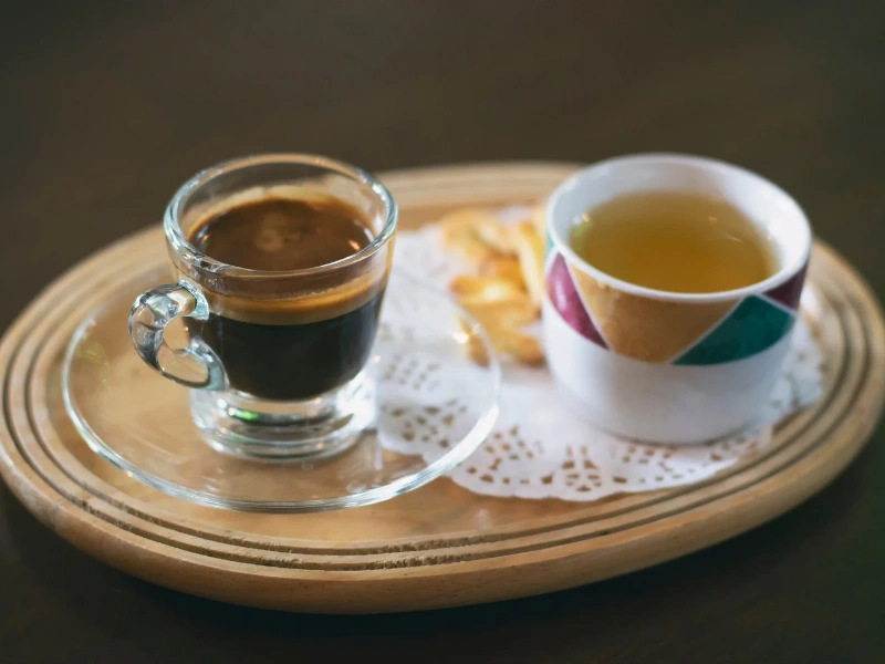 Green tea, coffee, and microgreen smoothie prepared for antioxidant support.