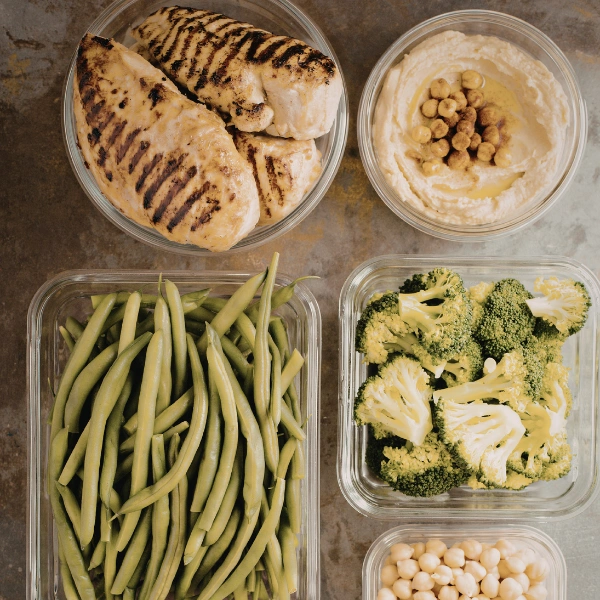 Image of grilled chicken and prepared meals.