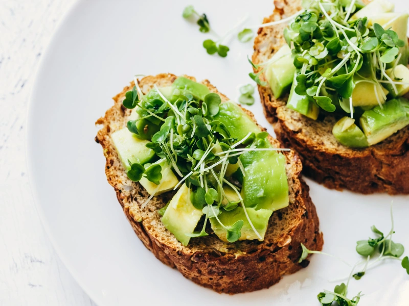 Image showing adding microgreens to morning meals.