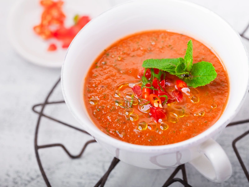 Image showing fresh gazpacho soup with garnish.