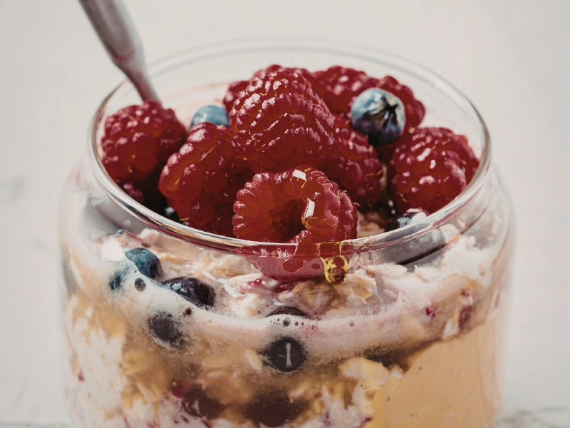 Image showing overnight oats with berries layered.